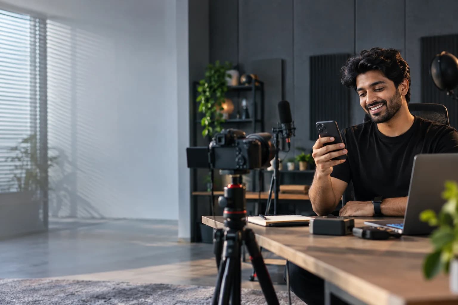 A tutorial creator checking a requested message after filming a video